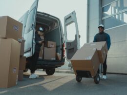 Man and Woman unloading Van