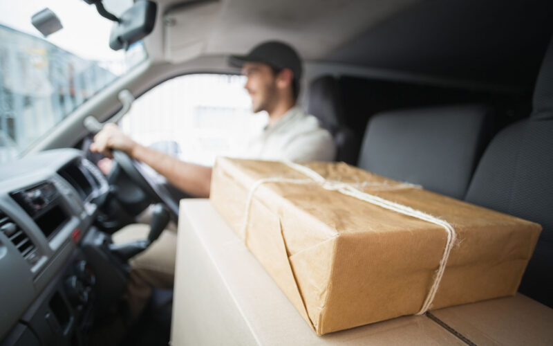 Driver delivering packages