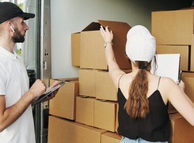 Man and woman checking packages in a truck as an example of how women are changing the face of logistic